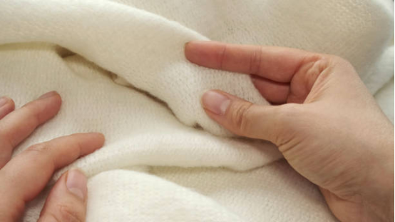 Wool blanket providing warmth and comfort for muscle recovery