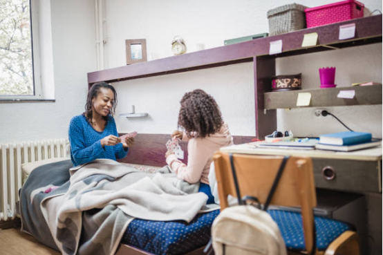 blanket creating personal space in shared dormitory