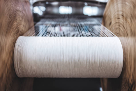 Close-up of a soft blanket showing fiber texture and weave pattern.