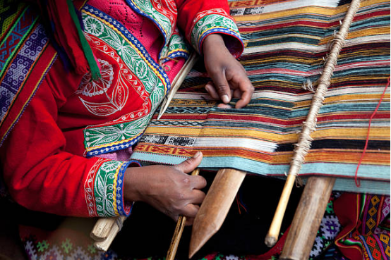 Wool and cotton fibers used in blanket manufacturing for warmth and breathability.